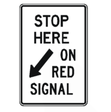 STOP HERE ON RED SIGNAL